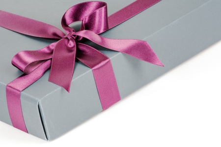 Fancy flat packed gift box with decorative ribbonの写真素材