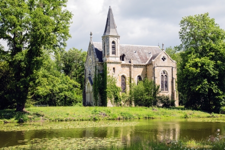 LA FERTE ST AUBIN â JUNE 08: Island of the Chapel a part of La Ferte Castle from XVI century located on the ground of 40 hectares surrounded by a moat in La Ferte St Aubin in France on 08 June 2012のeditorial素材
