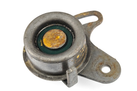 Useless, worn out and rusty idler pulleyの写真素材