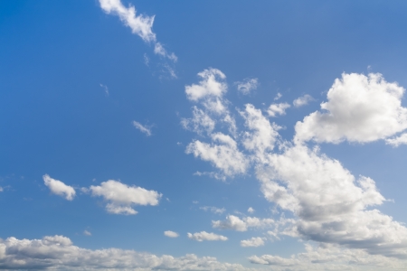 Clouds formed in an interesting way in the blue sky shown horizontallyの写真素材