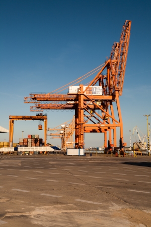 GDYNIA - JUNE 04: Port cranes in one of the largest in the Baltic Sea commercial port in container handling of about 700 TEUs in Gdynia in Poland on June 04, 2011のeditorial素材