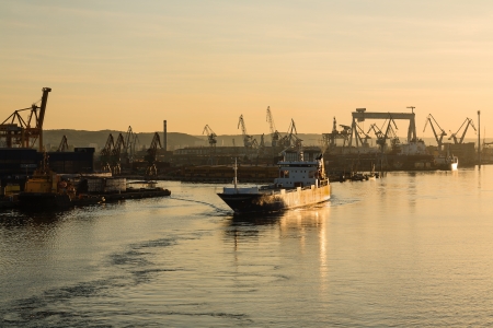 GDYNIA - JUNE 04: Sea road from one of the largest commercial ports in the Baltic Sea  in container handling of about 700 TEUs in Gdynia in Poland on June 04, 2011のeditorial素材