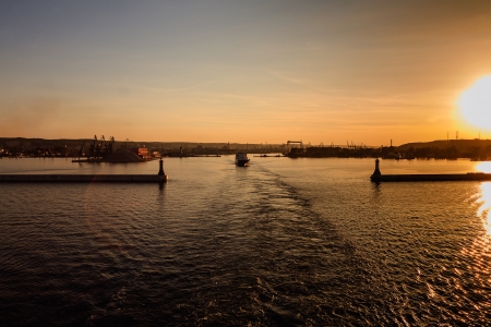 GDYNIA - JUNE 04: Sea road from one of the largest commercial ports in the Baltic Sea  in container handling of about 700 TEUs in Gdynia in Poland on June 04, 2011のeditorial素材