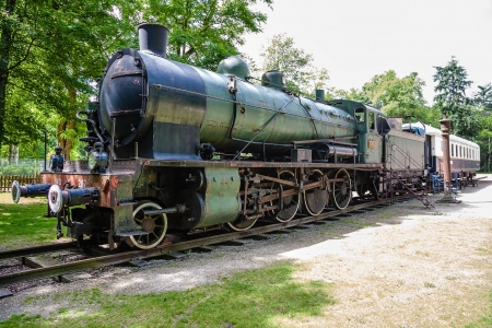 LA FERTE ST AUBIN - JUNE 08: Steam Locomotive model 140 C 287 and rail wagon from the early XX century stands at Orient Express railway station in La Ferte Saint Aubin in France on June 08, 2012のeditorial素材