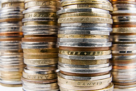 Various coins placed in stacks shown up closeの写真素材