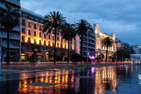 NICE - MAY 21: Promenade des Anglais and the famous Hotel Mediterranee and Casino seen by night from the distance in Nice in France on May 21, 2012.のeditorial素材
