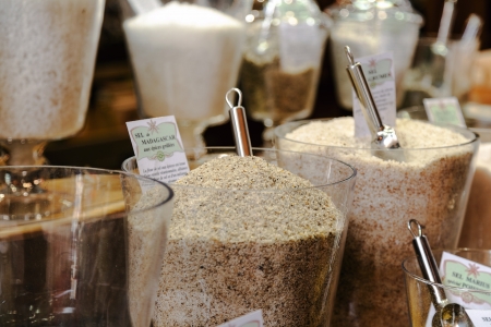NICE - MAY 22: Madagascar salt in the glass container among other salts offered for sale at the local market in Nice, France on May 22, 2012のeditorial素材