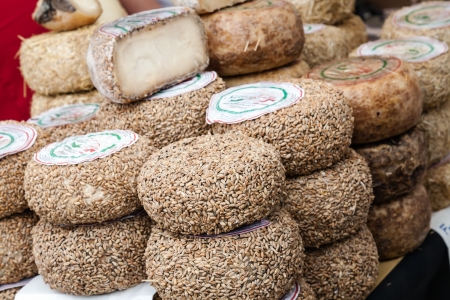 NICE, JULY 01: Italian cheeses for sale at the organic products market in Nice, France on July 01, 2012のeditorial素材