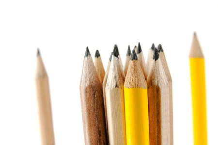 Pencils made of natural wood unpainted and among them two yellowの写真素材