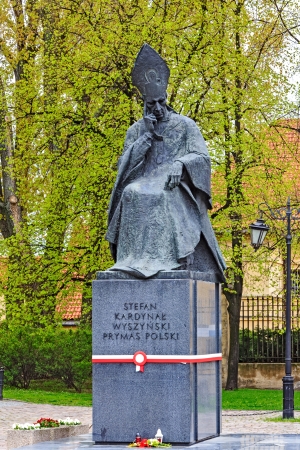 WARSAW - MAY 04: Statue of Cardinal Primate Stefan Wyszynski, unveiled on May 27, 1987, on the occasion of the flag day on May 02, decorated with the national colors in Warsaw, Poland on May 04, 2013のeditorial素材