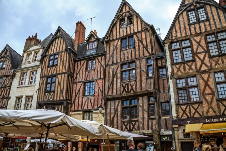 TOURS - JUNE 12: Half-timbered houses dating from the XV century on Plumereau Square, famous of bustling weekly markets and fairs in Tours, France on June 12, 2012のeditorial素材