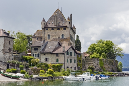 YVOIRE - MAY 24: Yvoire Castle, known as Chateau d'Yvoire  built in the early XIV century by Amadeus V, in the years 1919 -1939 restored by the d'Yvoire family in Yvoire in France on May 24, 2013のeditorial素材