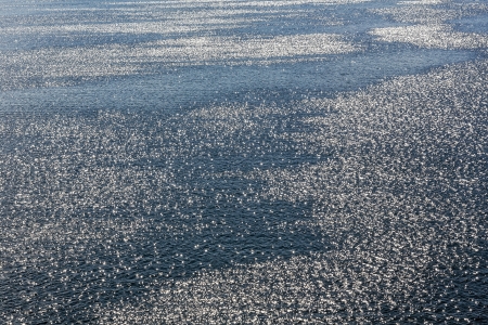 Surface of the Lake Geneva and the reflections of the sun in afternoon in Montreuxの写真素材