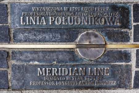 WROCLAW - OCTOBER 07  Symbolic meridian line designed in year 1791 by professor Longinus Anton Jungnitz, placed in the form of bronze plate, in the pavement, in Wroclaw in Poland on October 07, 2013のeditorial素材