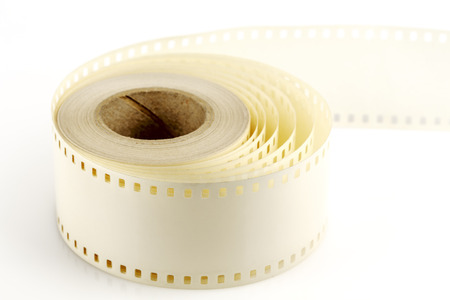 Mounting tape to 35mm film on the spoolの写真素材