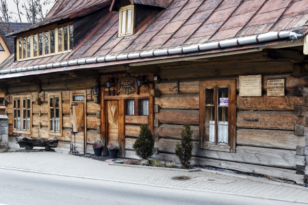 ZAKOPANE - NOVEMBER 19: Restaurant U Wnuka was established in 1907 in a wooden building built by Jozef Krzeptowski in the mid-nineteenth century in Zakopane in Poland on November 19, 2013のeditorial素材
