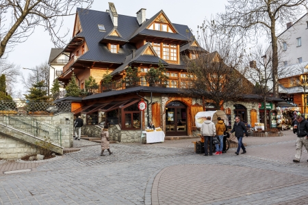 ZAKOPANE - NOVEMBER 16  Siklawa Inn in Regional Building offers 160 seats on the ground floor belonging to the neighboring Hotel Sabala at Street Krupowki in Zakopane, Poland on November 16, 2013のeditorial素材