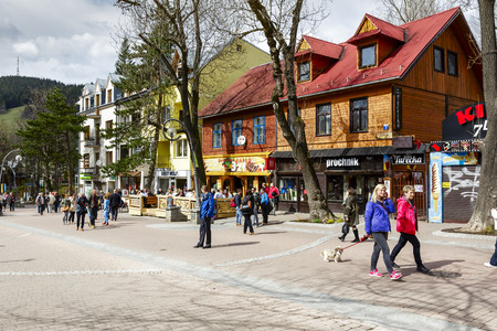 ZAKOPANE, POLAND - APRIL 20, 2014  Architecture along the Krupowki street, the main shopping area and pedestrian promenade in the city のeditorial素材