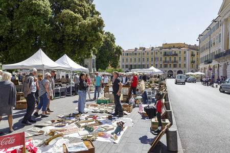 NICE, FRANCE - MAY 17, 2014  The Antique Market, held on Saturdays, on the built late 18th century Garibaldi square, located at the outskirts of the Old Townのeditorial素材