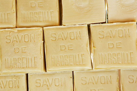 NICE, FRANCE - MAY 18, 2014  Marseille soap also called Savon de Marseille, put up for sale at the market, traditional soap made from vegetable oils, under the same name produces for about 600 yearsのeditorial素材