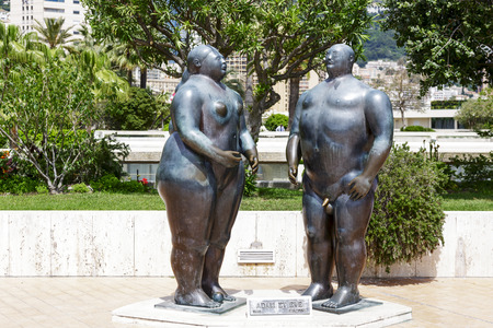 MONTE CARLO, MONACO - MAY 12, 2014  Bronze sculpture of Adam and Eve  1981  by Colombian figurative artist and sculptor Fernando Botero, located in gardens behind the Casino and Opera Houseのeditorial素材