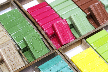 NICE, FRANCE - MAY 11, 2014: Marseille soap also called Savon de Marseille, put up for sale at the market, traditional soap made from vegetable oils, under the same name produces for about 600 yearsのeditorial素材