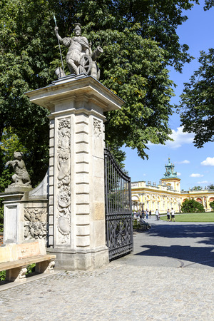 WARSAW, POLAND - AUGUST 20, 2014: Made of stone entrance gate built in the last quarter of the 17th century by Augustine Locci, the main entry to the suburban residence of King Jan III Sobieskiのeditorial素材