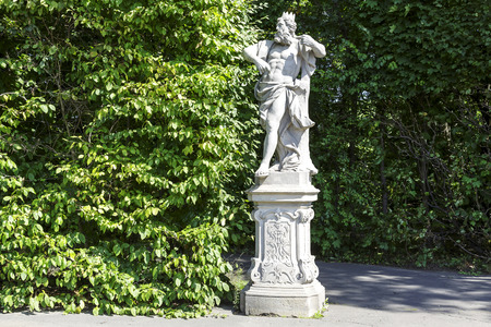 WARSAW, POLAND - AUGUST 20, 2014: Garden Sculpture in the Wilanow park created in the 2nd half of the 17th century together with the Royal Palace built for King Jan III Sobieskiのeditorial素材