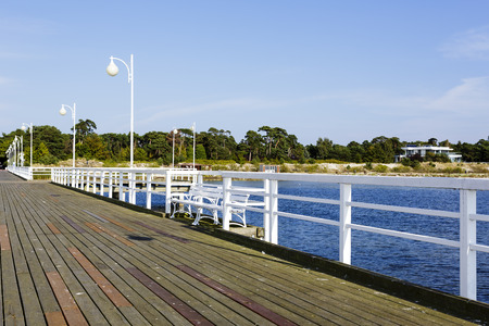 JURATA, POLAND - SEPTEMBER 11, 2014: Wooden Pier with a length of 320 meters, built in the 70s of the 20th century, located at the Baltic Sea coast at the waters of the Gulf of Puckのeditorial素材