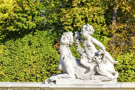 WARSAW, POLAND - OCTOBER 04, 2014: Garden Sculptures in the Wilanow park created in the 2nd half of the 17th century together with the Royal Palace built for King Jan III Sobieskiのeditorial素材