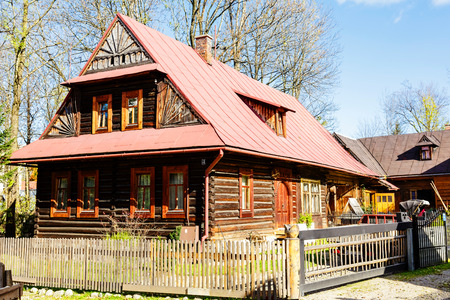 ZAKOPANE, POLAND - OCTOBER 14, 2014: Made of wood, residential building dating from approx. 1926, listed in the municipal register of architectural heritageのeditorial素材