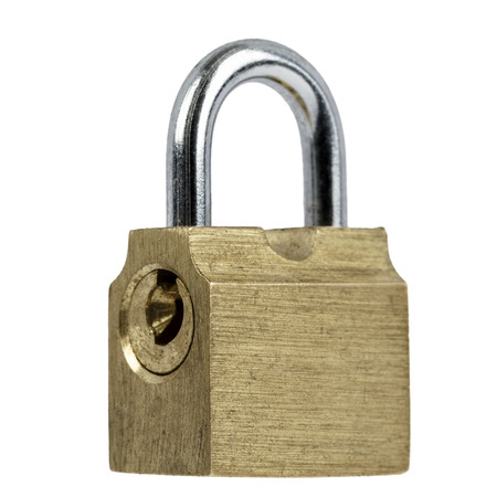 Padlock made according to old technology, isolated on white backgroundの写真素材