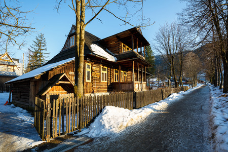 ZAKOPANE, POLAND - MARCH 08, 2015: Made of wood Villa Koszysta, built in 1902, located at Pilsudskiego street, listed in the register of architectural monumentsのeditorial素材