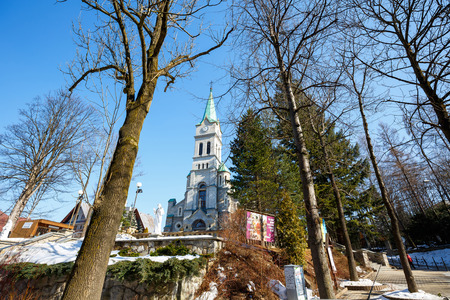 ZAKOPANE, POLAND - MARCH 09, 2015: Holy Family Church built in 1879-1896 in the Romanesque Revival style by architect Jozef Pius Dziekonskiのeditorial素材