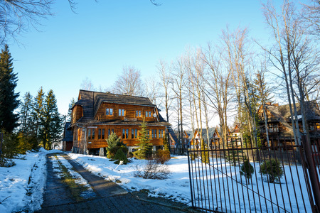 ZAKOPANE, POLAND - MARCH 09, 2015: Villa named Jedynaczka, guest house offers vacation stay in a traditional decorated guest rooms in wooden villa built in the style of the regionのeditorial素材