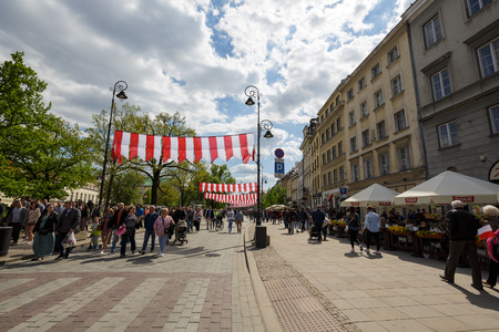 WARSAW POLAND  MAY 03 2015: Trakt Krolewski Street in year 1994 declared a historical monument on the occasion of the flag day decorated with the national colorsのeditorial素材