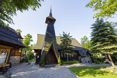 ZAKOPANE, POLAND - JUNE 12, 2015: Church of the Salvatorian Priests, built of wood in years 1956-1968, architects have joined in the project the architectural style of Zakopane and modern for its timeのeditorial素材