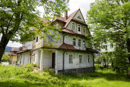 ZAKOPANE, POLAND - JUNE 14, 2015: Villa called Maryska, built of wood probably at the turn of the 19th and 20th century, nowadays greatly devastated buildingのeditorial素材