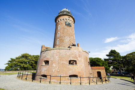 KOLOBRZEG, POLAND - JULY 15, 2015: The Lighthouse, rebuilt after the ravages of World War II in 1945, the height of the lighthouse is 26 meters above ground, its range reaches up to 16 nautical milesのeditorial素材