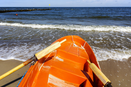 Prow of rescue boat on the sea shore in Kolobrzeg in Polandの写真素材