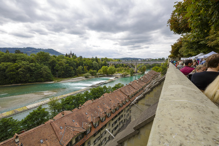 BERN, SWITZERLAND - SEPTEMBER 05, 2015: The river Aare flows through the city of Bern. Bern with a population of approx. 140000 citizens it is the fourth most populous city in Switzerlandのeditorial素材