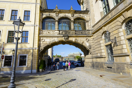 DRESDEN, GERMANY - SEPTEMBER 19, 2015: The overhead arched bridge built the early 18th century to connect from The Royal Palace to The Taschenberg palaceのeditorial素材
