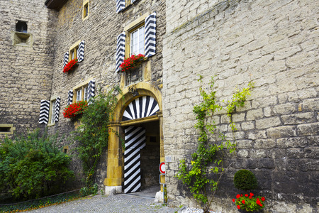 MORAT MURTEN, SWITZERLAND - SEPTEMBER 15, 2015: Entry gate to Castle Of Murten dates to the time of Count Peter of Savoy II who ordered its construction in 1255, Today's castle dates back to 1755のeditorial素材