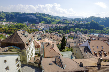 FRIBOURG, SWITZERLAND - SEPTEMBER 10, 2015: The capital city of the canton of Fribourg, located on both sides of the river Sarine which shares two linguistic regions between German and French culturesのeditorial素材