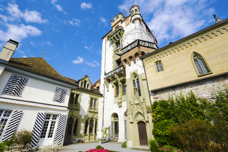 OBERHOFEN, SWITZERLAND - SEPTEMBER 08, 2015: Castle of Oberhofen dates back history to the 13th century. Branch museum of the Historic Museum of Berne opened to the public since 1954のeditorial素材