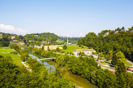 FRIBOURG, SWITZERLAND - SEPTEMBER 10, 2015: Landscape of green areas of the city, located on both sides of the river Sarine which shares two linguistic regions between German and French culturesのeditorial素材