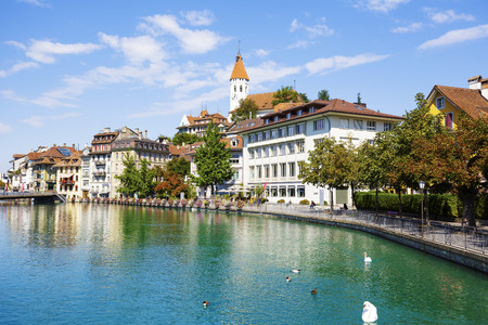 THUN, SWITZERLAND - SEPTEMBER 08, 2015: River Aare and the Town of Thun. Thun with a population of approx. 45000 citizens it is a city located in the canton of Bern, situated on the River Aareのeditorial素材