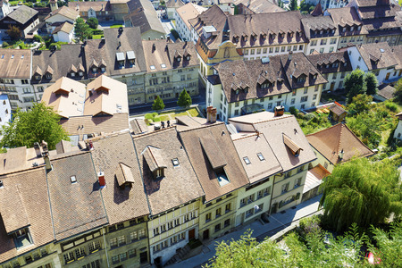 FRIBOURG, SWITZERLAND - SEPTEMBER 10, 2015: The capital city of the canton of Fribourg, located on both sides of the river Sarine which shares two linguistic regions between German and French culturesのeditorial素材