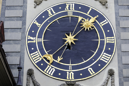 BERN, SWITZERLAND - DECEMBER 22, 2015: Massive clockface of Zytglogge, its general layout is dated back to 1770. It is on the first western gate of the city 1191 - 1256, famous tourist attractionのeditorial素材