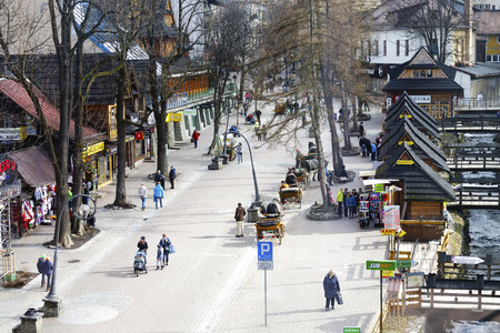 ZAKOPANE, POLAND - MARCH 09, 2016: Aerial view towards Krupowki street. It is main shopping area and pedestrian promenade in the downtown is very famous and frequently visited by touristsのeditorial素材